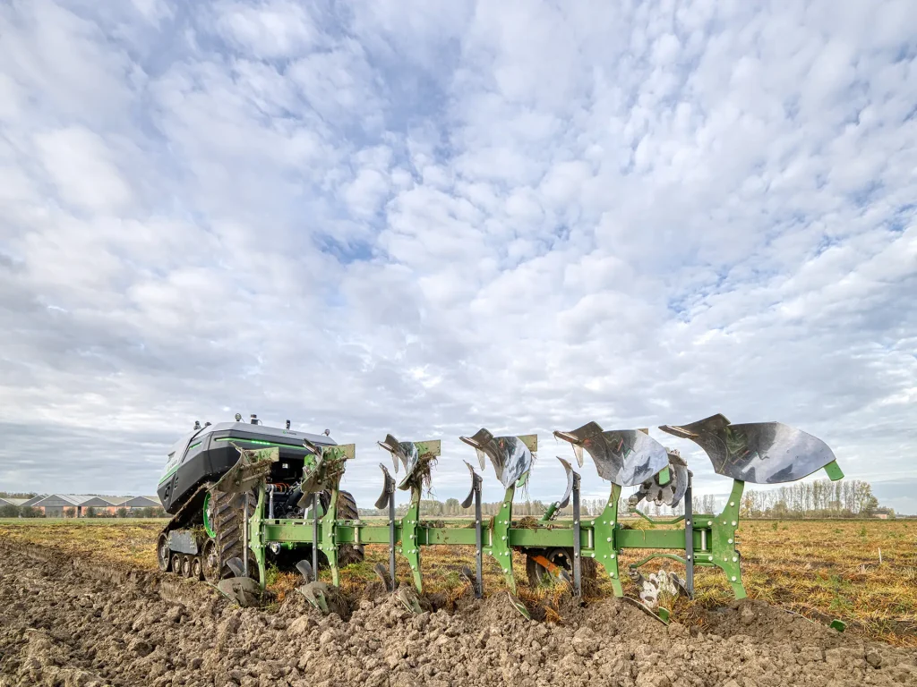 AgXeed autonomous equipment working in vineyard rows