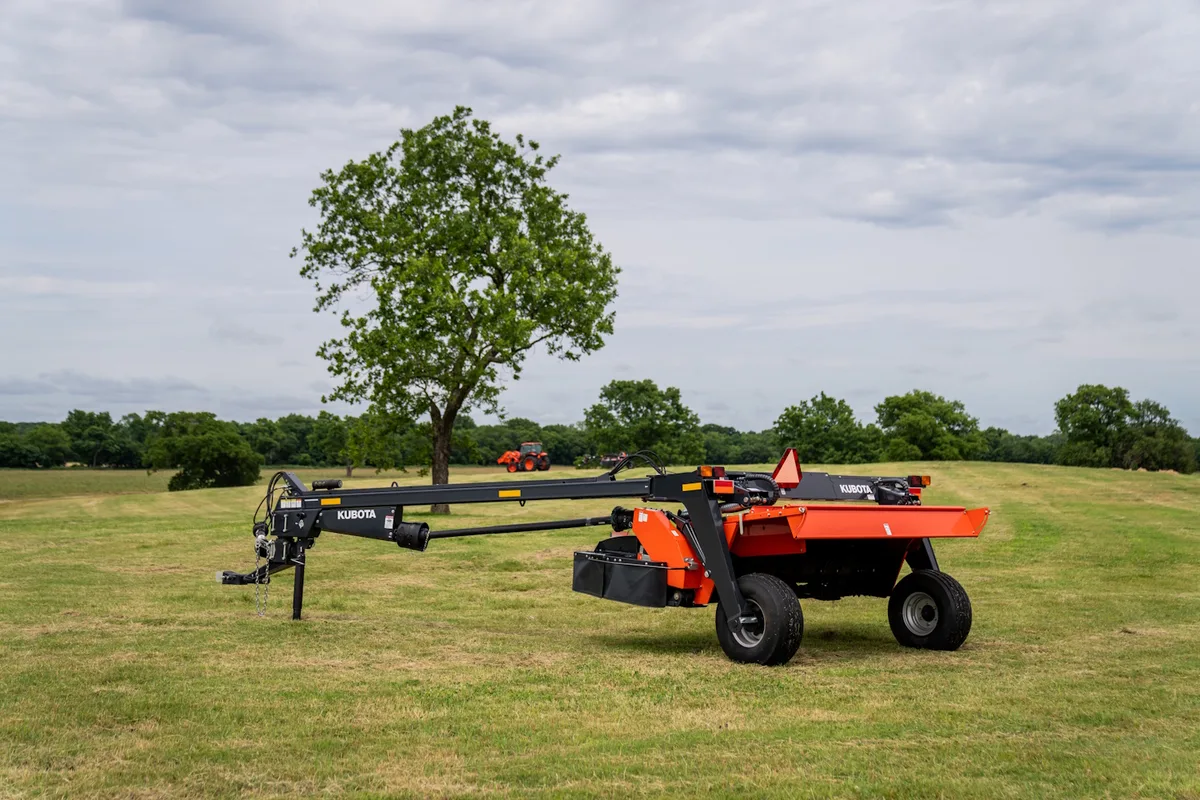 Kubota DMC disc mower conditioner in a hay field