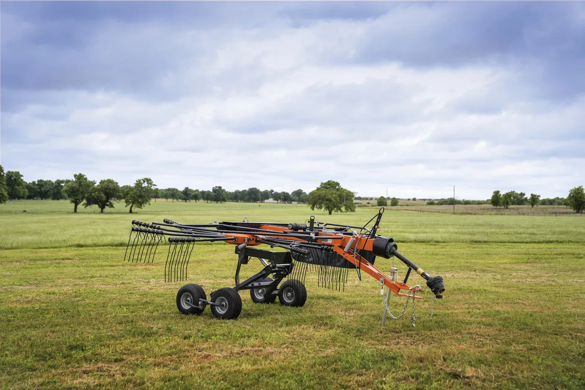 Kubota RA rotary rake in a hay field
