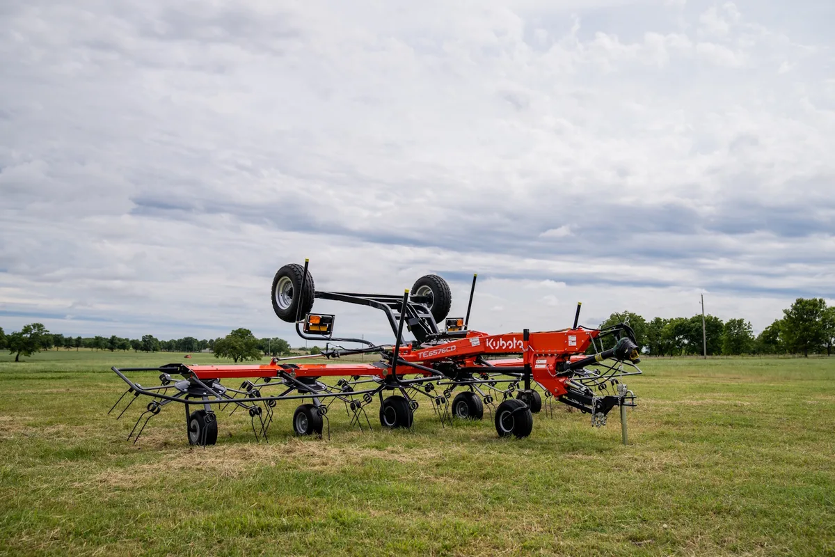Kubota TE rotary tedder in a hay field