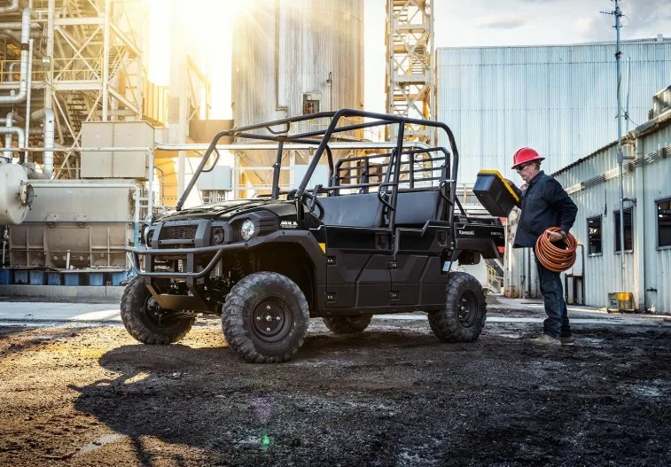 Kawasaki MULE PRO-DX three-passenger diesel utility vehicle at an industrial work site