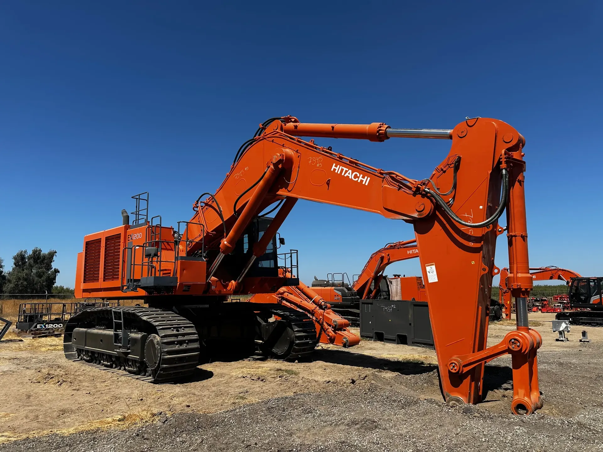 Hitachi excavators in an equipment yard