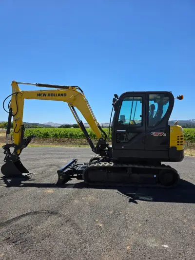 Actual stock photo 7 of New Holland E57C, stock 006901