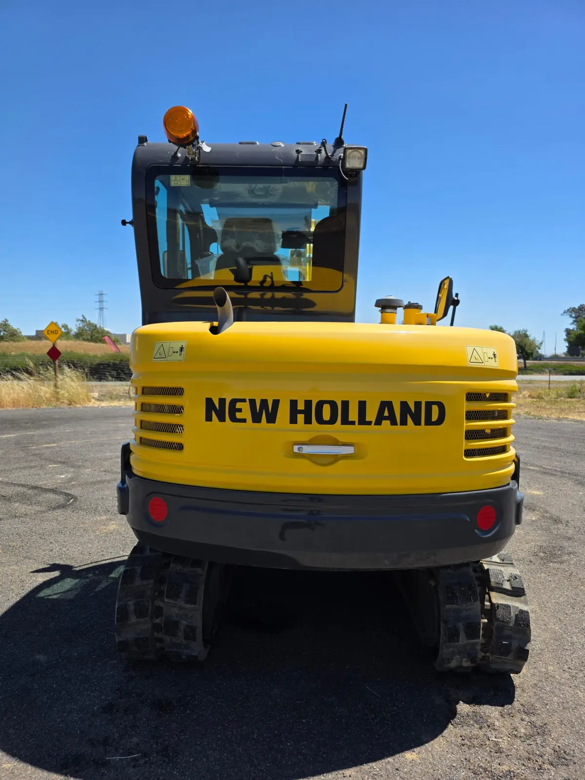 Actual stock photo 3 of New Holland E57C, stock 006901
