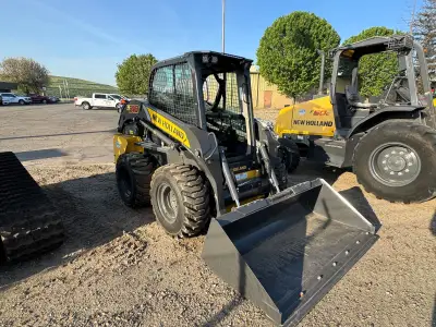 Actual stock photo of New Holland L318, stock F93000