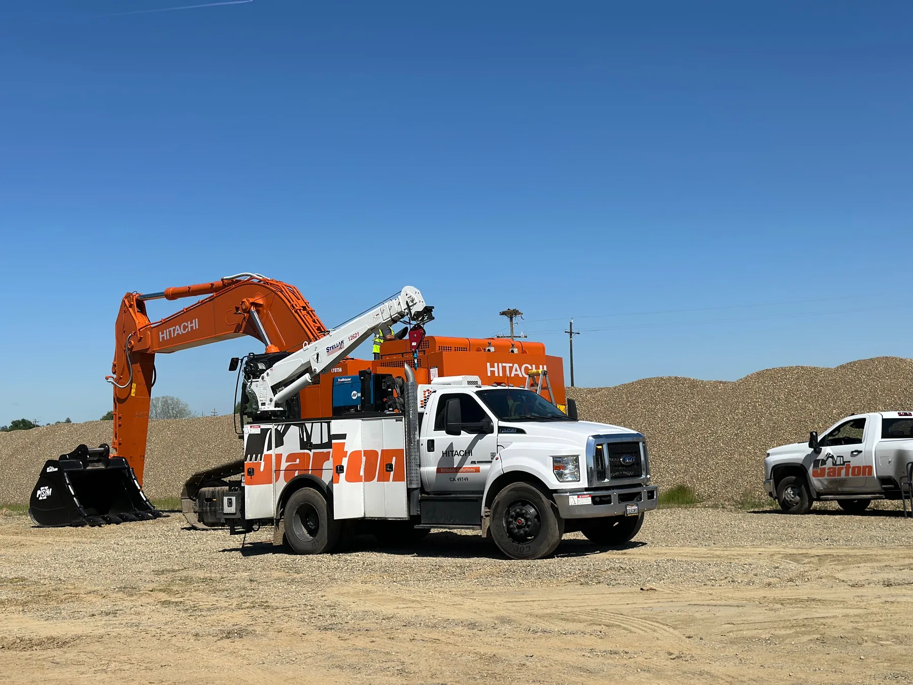 Garton field service trucks supporting Hitachi equipment