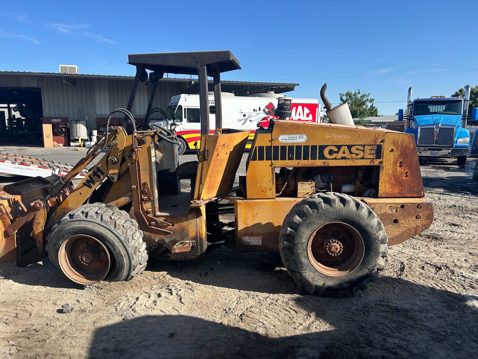 Older Case wheel loader photographed before an emissions-replacement project