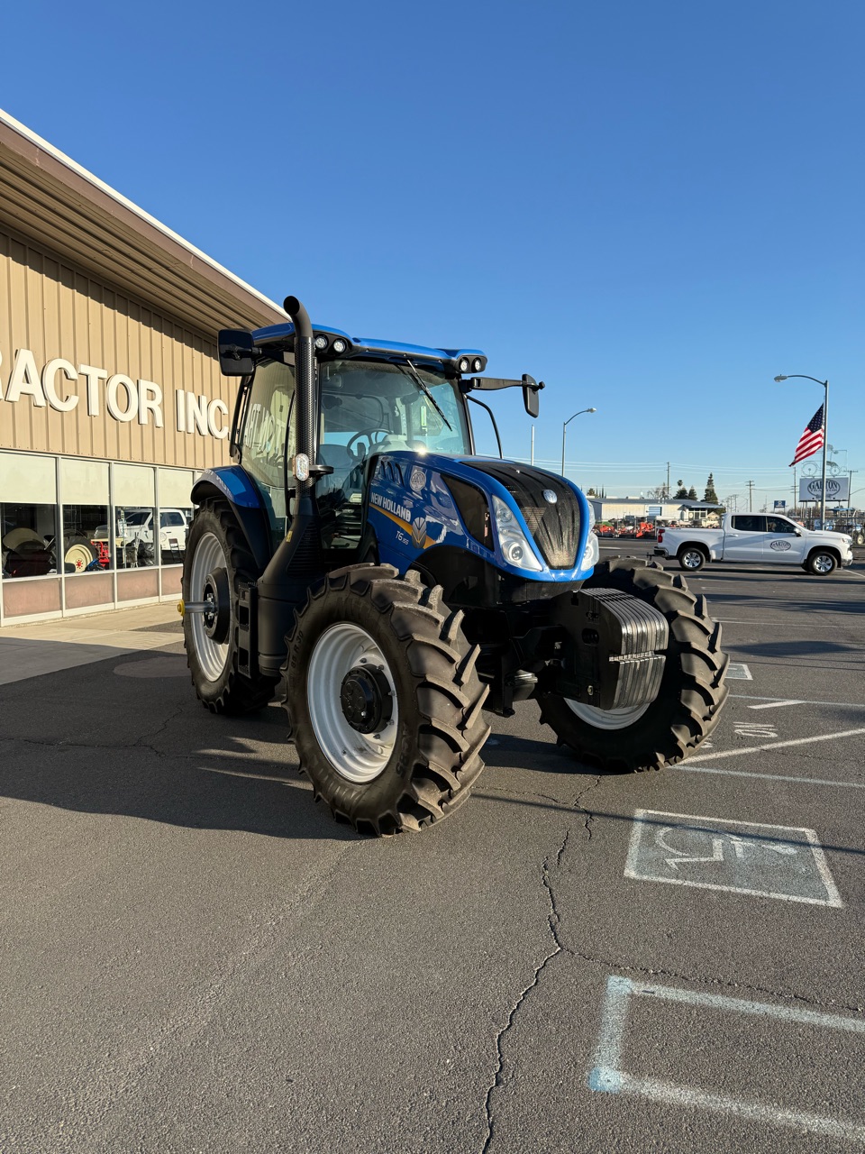 Actual stock photo of New Holland T6.155 EC, stock 000202