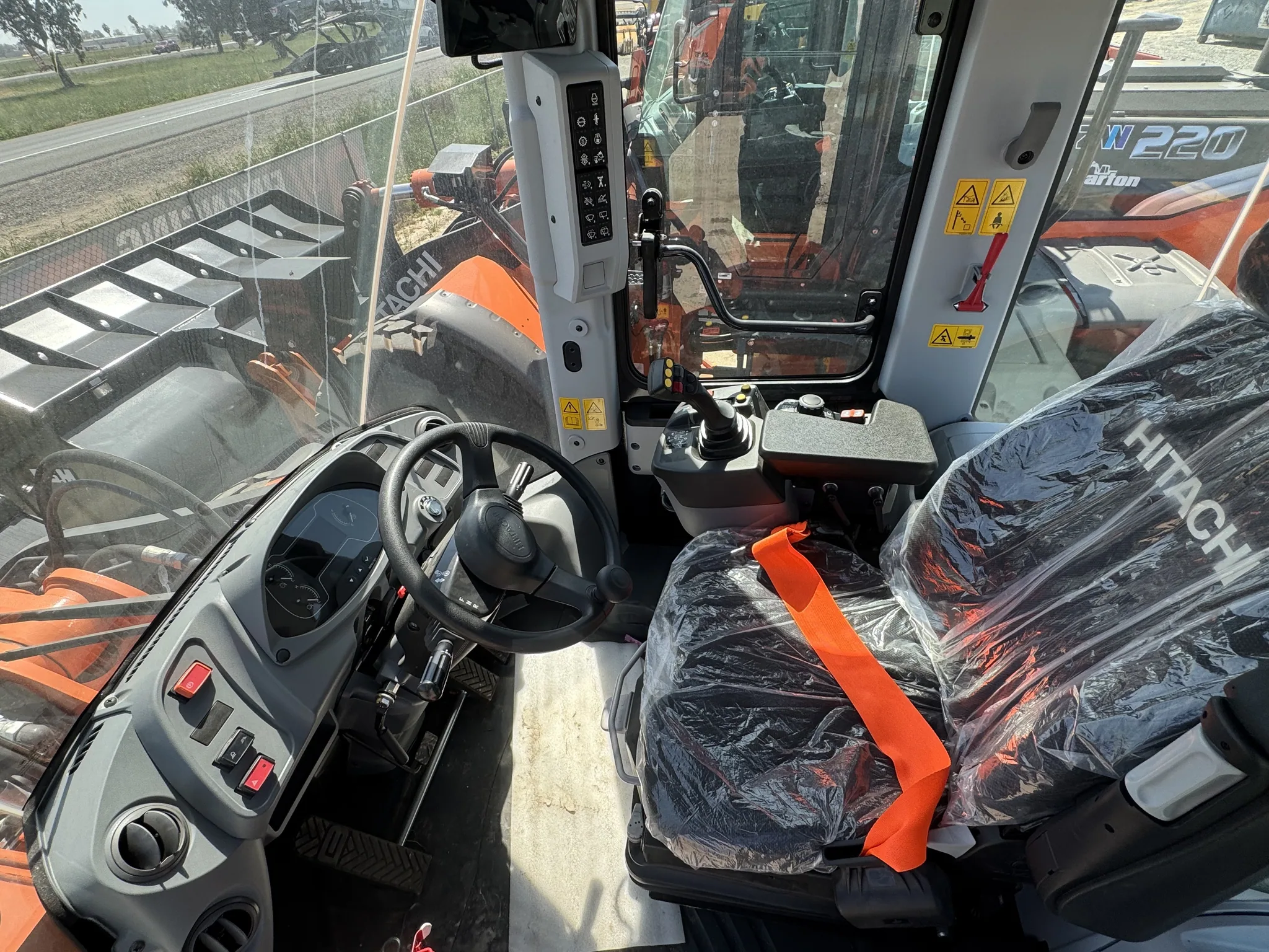 Actual stock photo of Hitachi LANDCROS ZW180-7, stock 003295