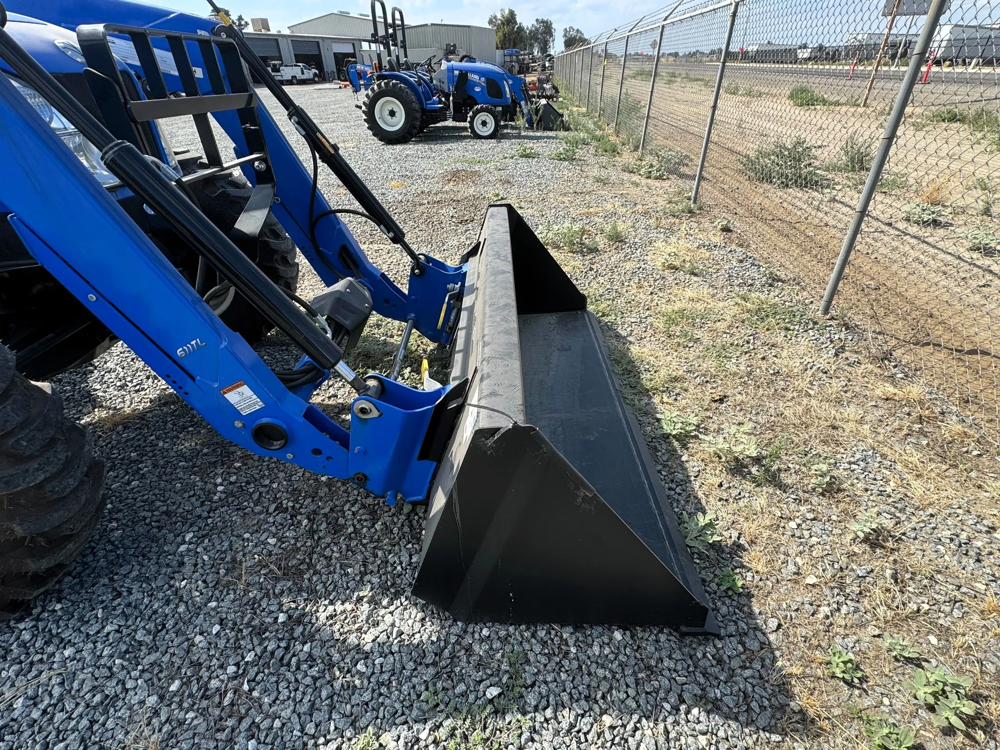 Actual stock photo of New Holland 611TL, stock 021802