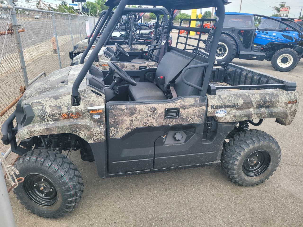 Actual stock photo of Kawasaki PRO-MX CAMO, stock 021719