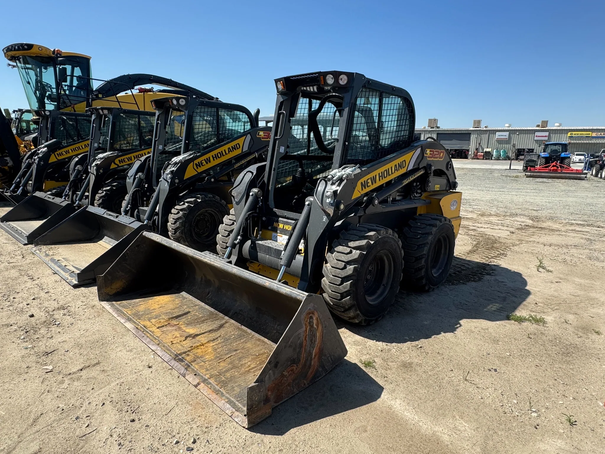 Actual stock photo of New Holland L320, stock F93002