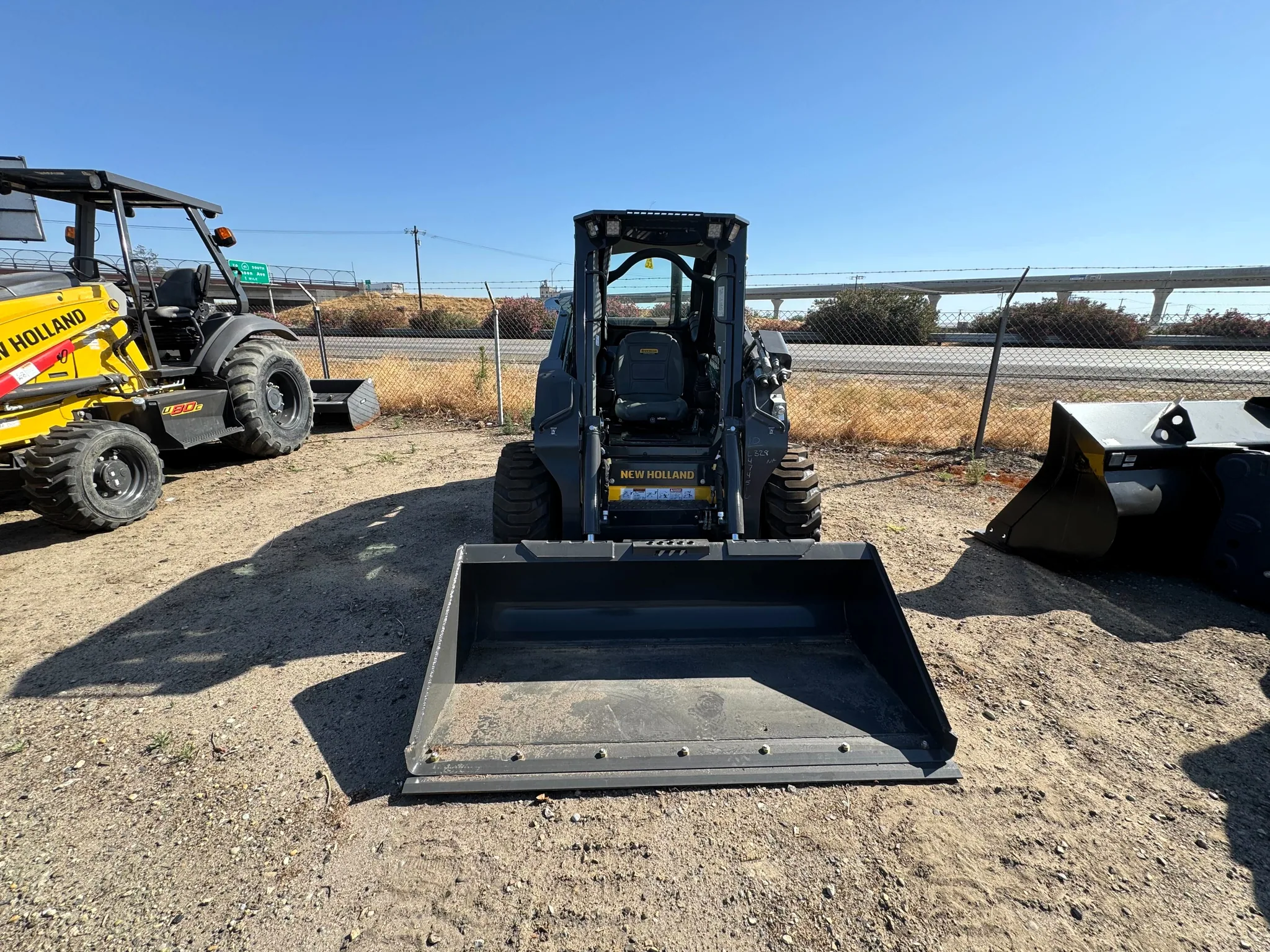 Actual stock photo of New Holland L328, stock 023911