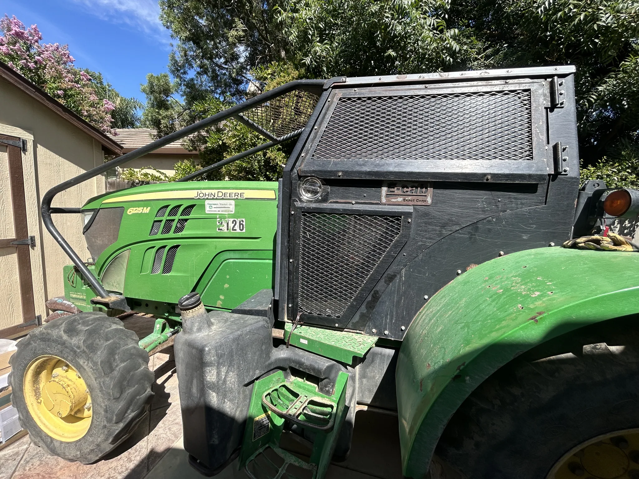 Actual stock photo of John Deere 6125M, stock 023340