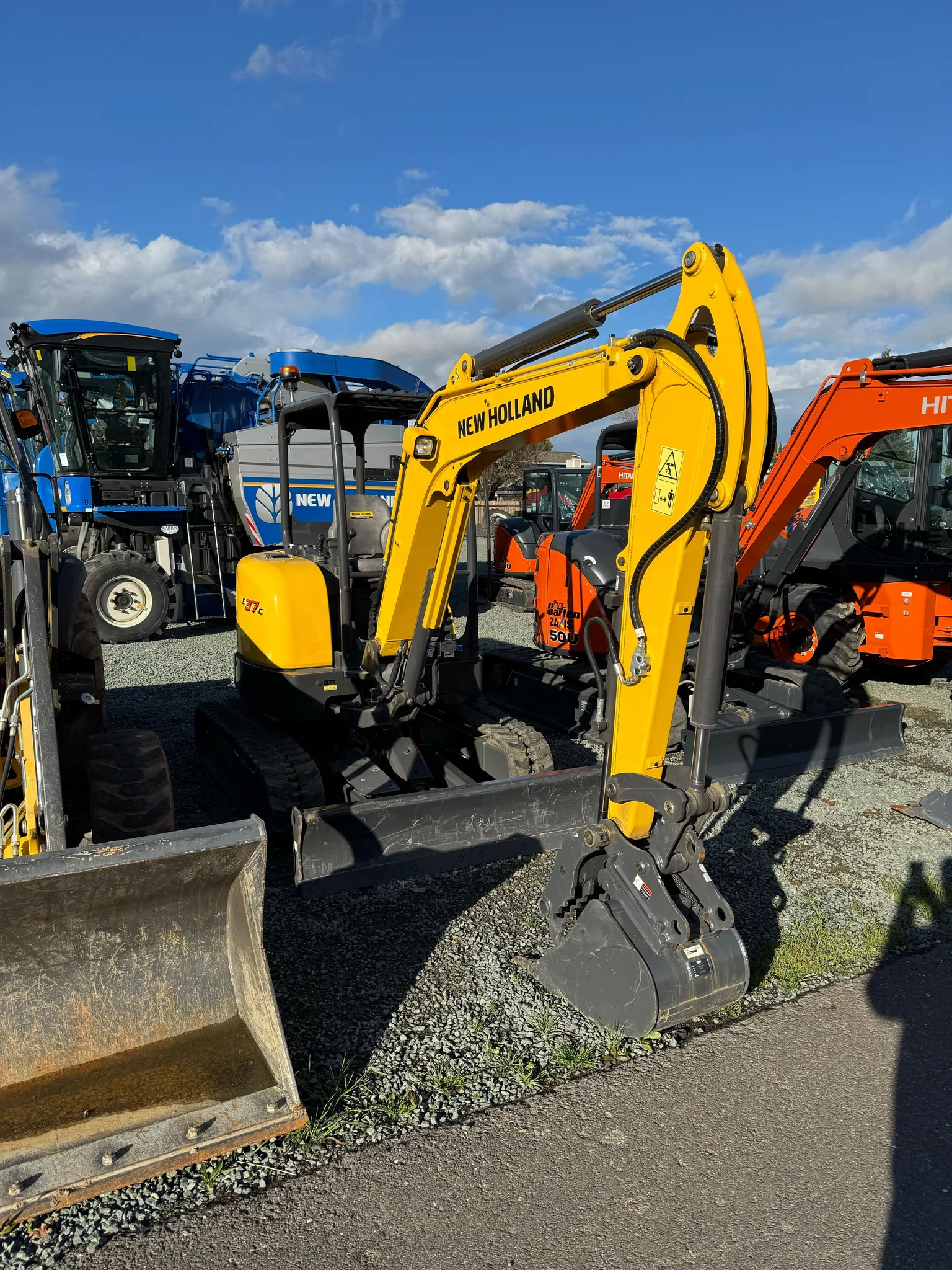 Actual stock photo of New Holland E37C, stock F92450