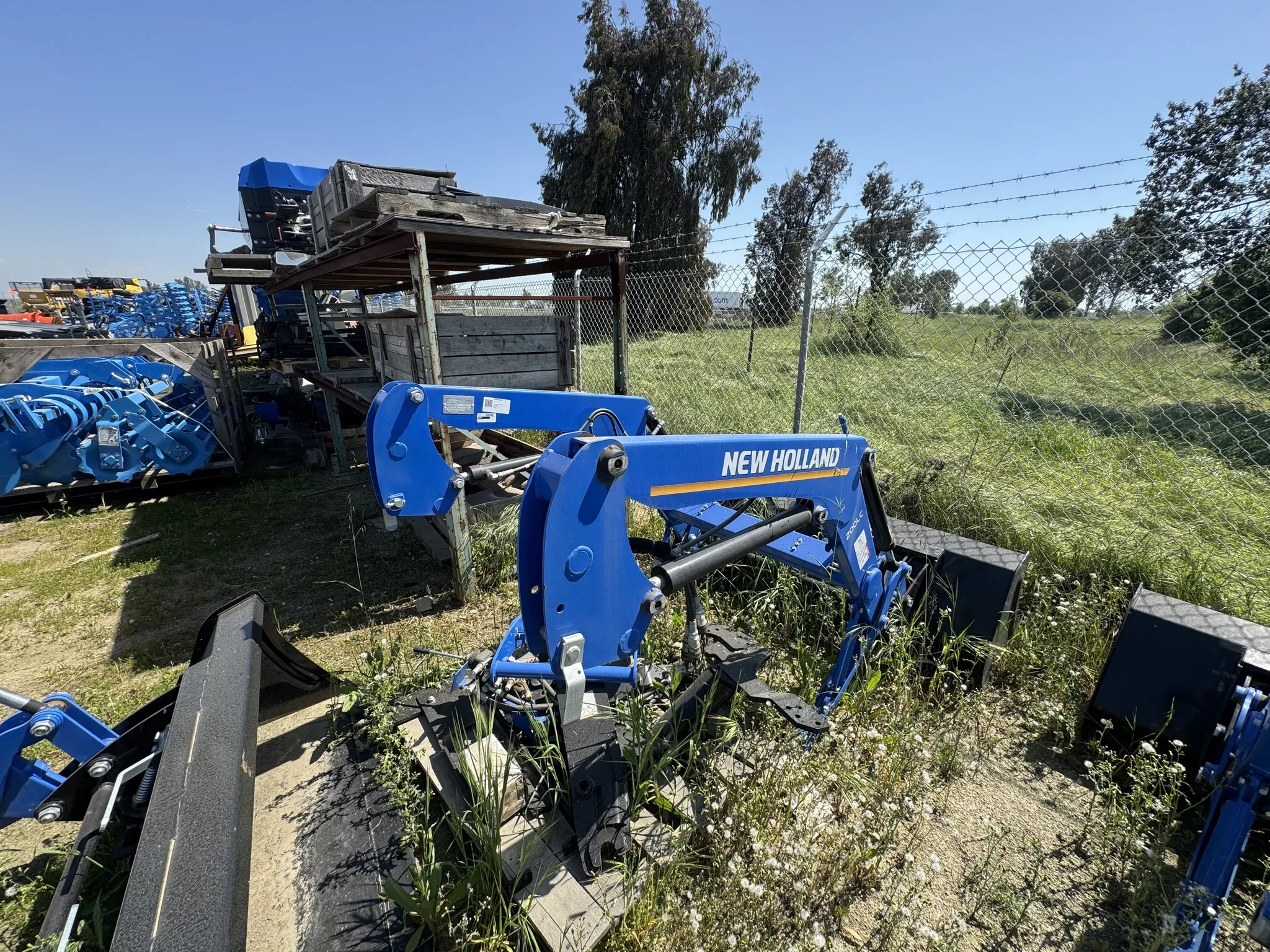 Actual stock photo of New Holland LC200, stock 013705