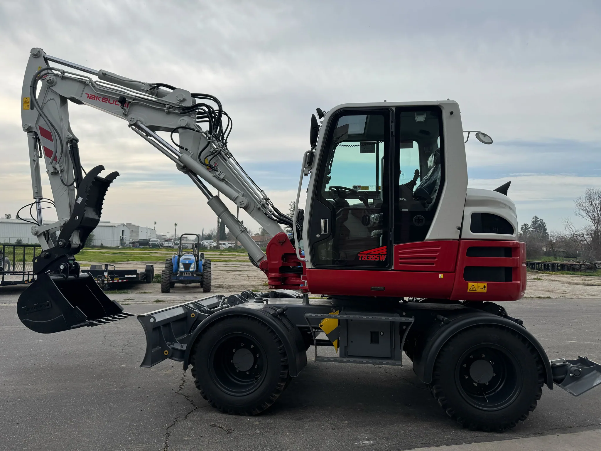 Actual stock photo of Takeuchi TB395W-4S, stock 025237