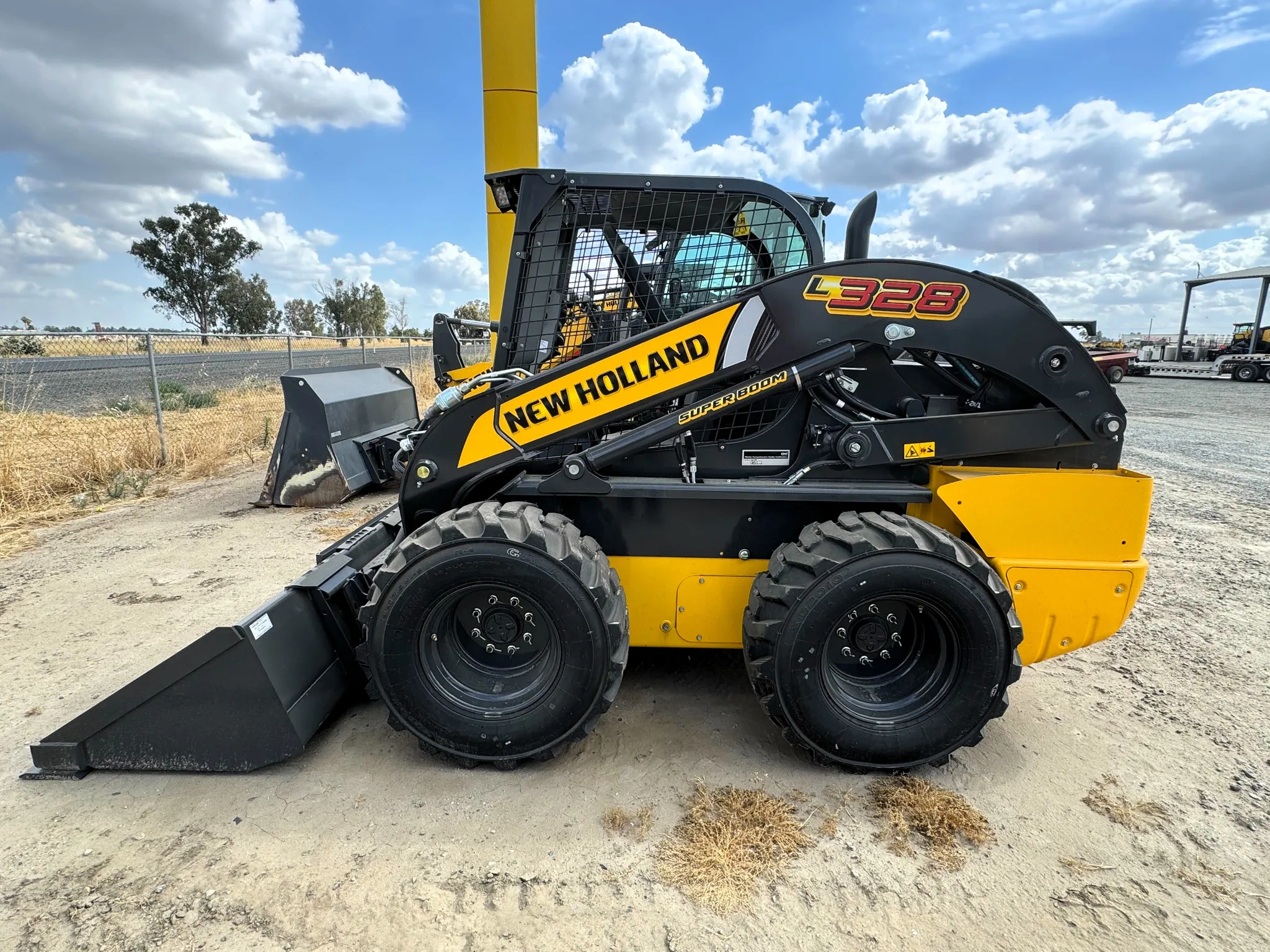 Actual stock photo of New Holland L328, stock 023920