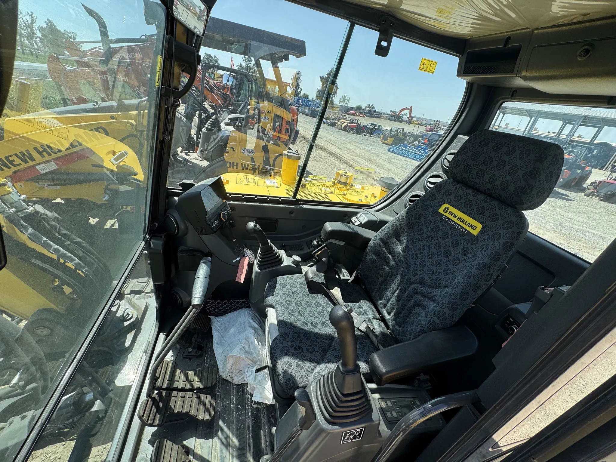 Actual stock photo of New Holland E57C, stock F92449